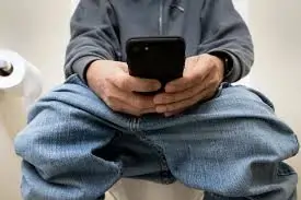 is it ok to use phone on toilet health risks